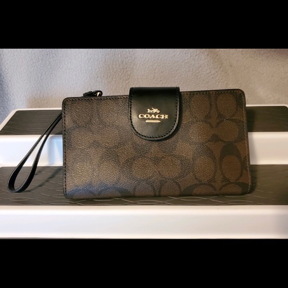 Coach Handbags - 🌺Authentic COACH Phone Case/Wallet. Brown/Black🌺